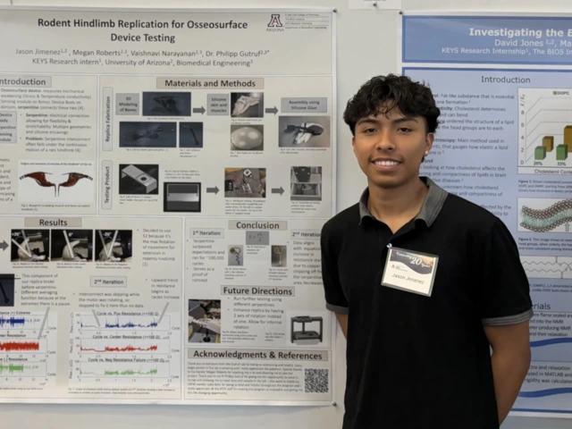 BASIS Tucson North graduate Jason Jimenez tests a device that binds to bone with mentor Philipp Gutruf, associate department head and associate professor of biomedical engineering.