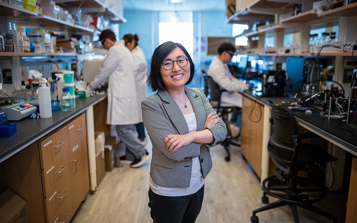 The University of Arizona’s Shang Song, Frank L. and Daphna Lederman Professor and assistant professor of biomedical engineering, supervises students in The Song Lab investigating health care devices that speed injury recovery.